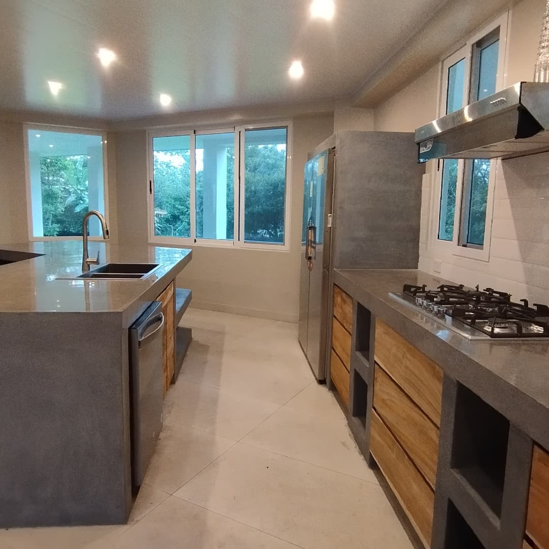Custom polished concrete kitchens — bespoke models.